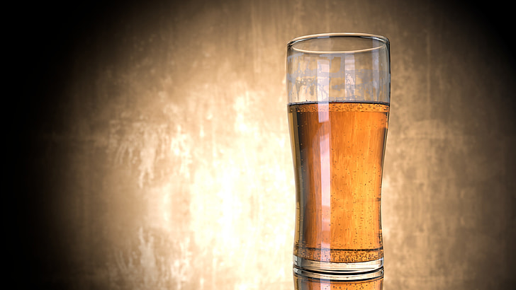 clear highball glass filled by brown liquid photograph