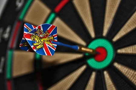 shallow focus photography of dart in bullseye