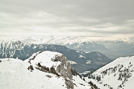 Aerial view of mountain range covered by snow