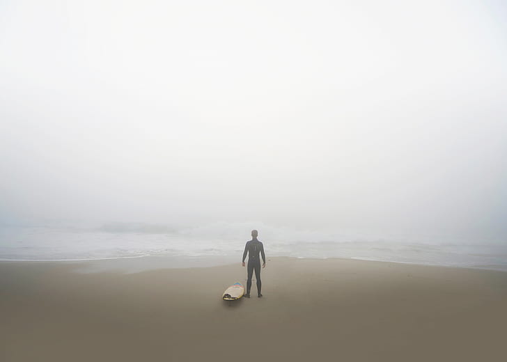 man standing near shore
