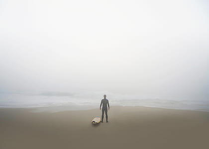 man standing near shore