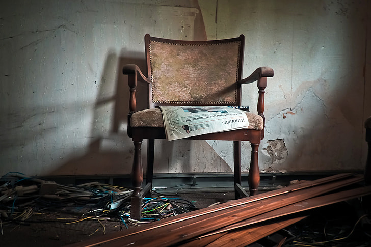 newspaper on chair