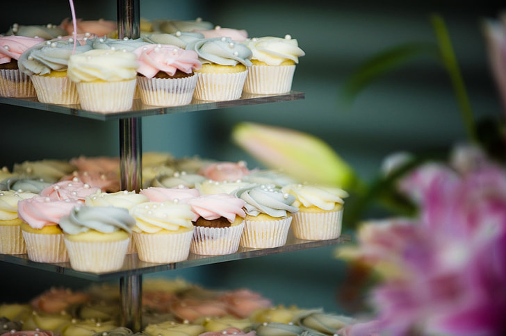 selective focus photo of assorted cupcakes