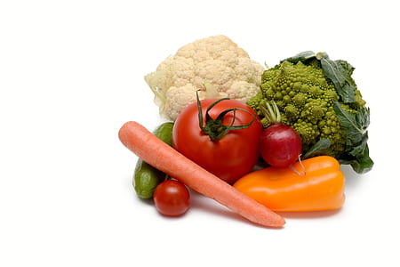 white cauliflower, green brocolli and orange carrots