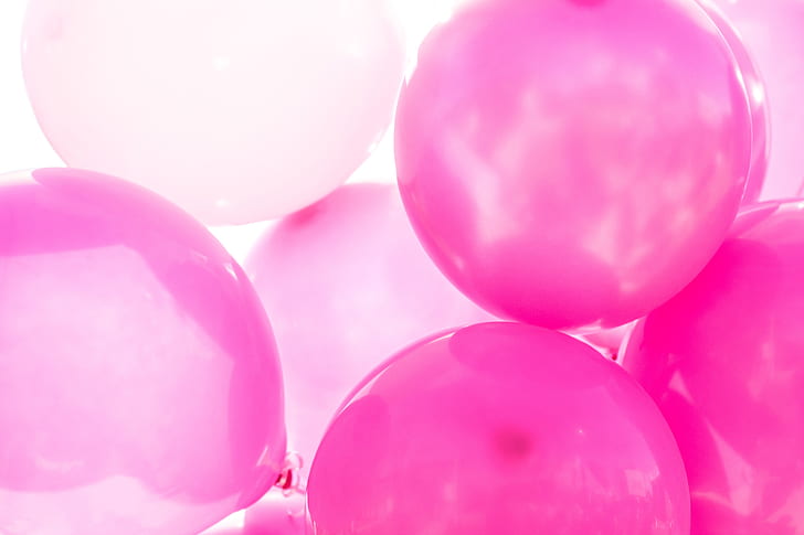closeup photo of pink balloons