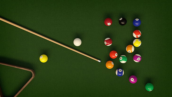 photograph of billiard balls, pile, and cue stick