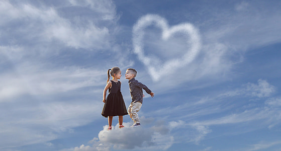 boy and girl on cloud during daytime