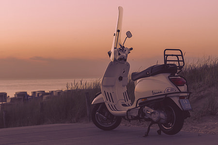 Moped bike captured at sunset