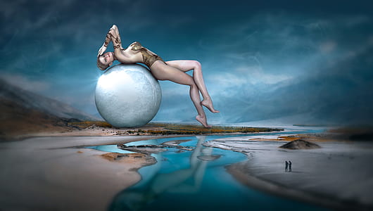 artwork of topless woman lying on white ball