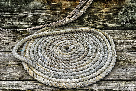 Grey Braided Rope on Wooden Plank