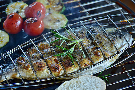 grilled fish with parsley on top