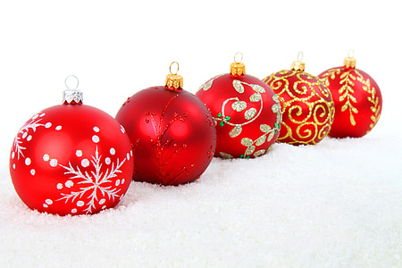 selective photo of five red baubles
