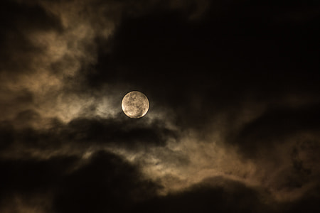 moon surrounded by clouds