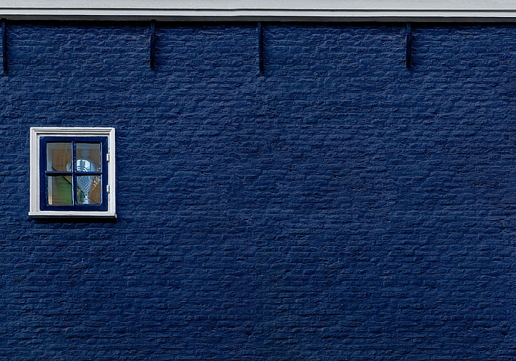 blue concrete wall with window