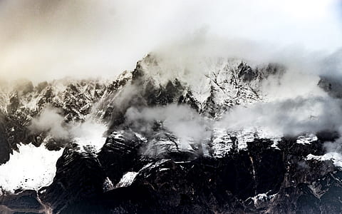 snow covered mountain grayscale photo
