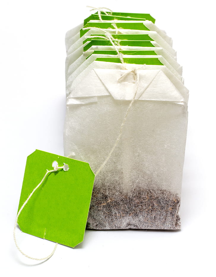 white and green tea bag