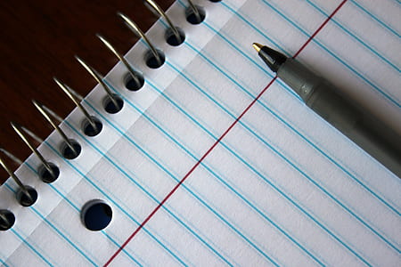 ballpoint pen on spring writing notebook