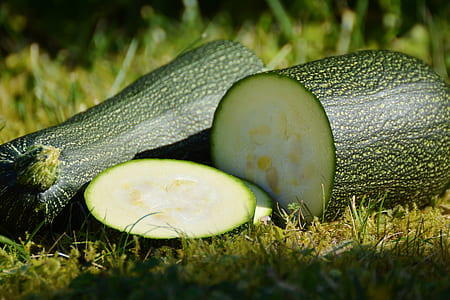 sliced vegetable on green grass