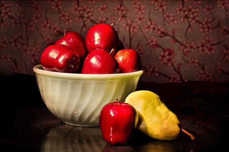 red apples and yellow pear
