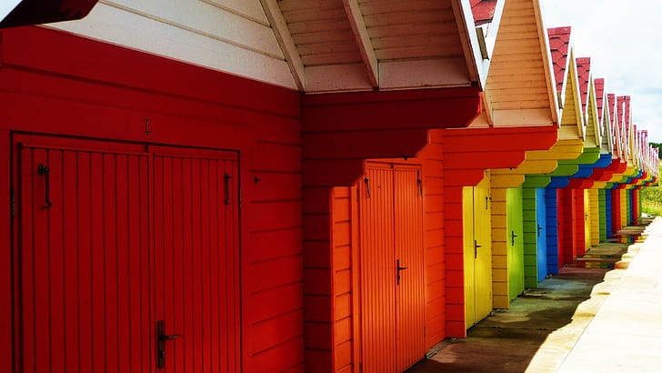 assorted-color wooden garages at daytime