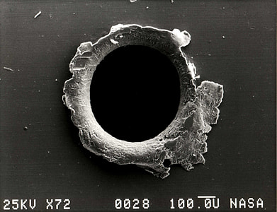 microscopic photography of hole