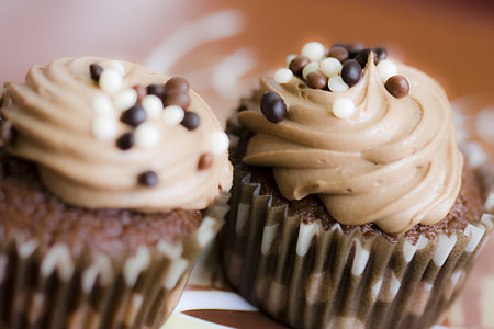 selective focus photography of brown cupcakes