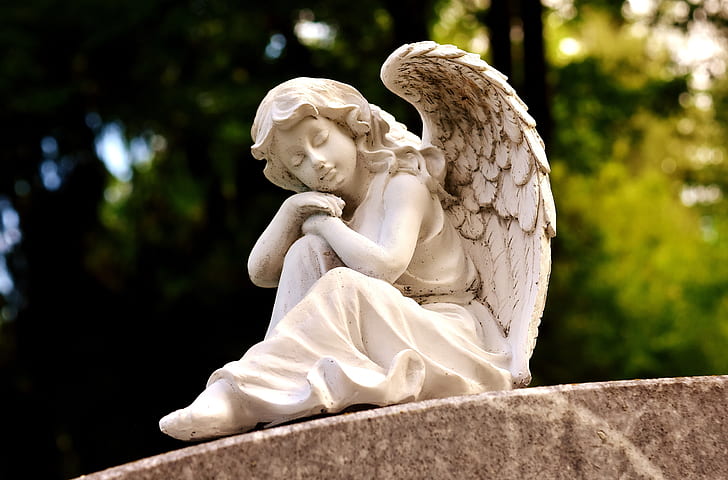 female angel sleeping statue