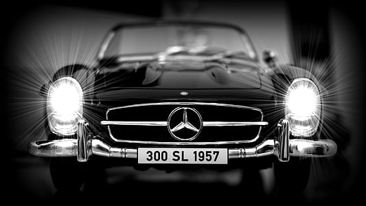 grayscale photography of Mercedes-Benz vehicle