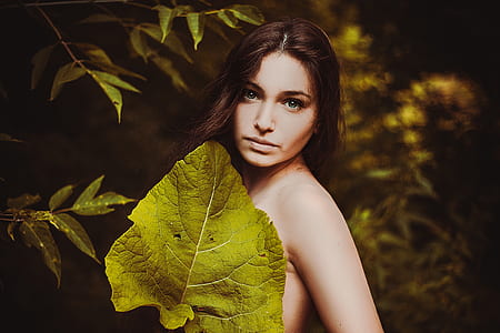 woman beside green leaf