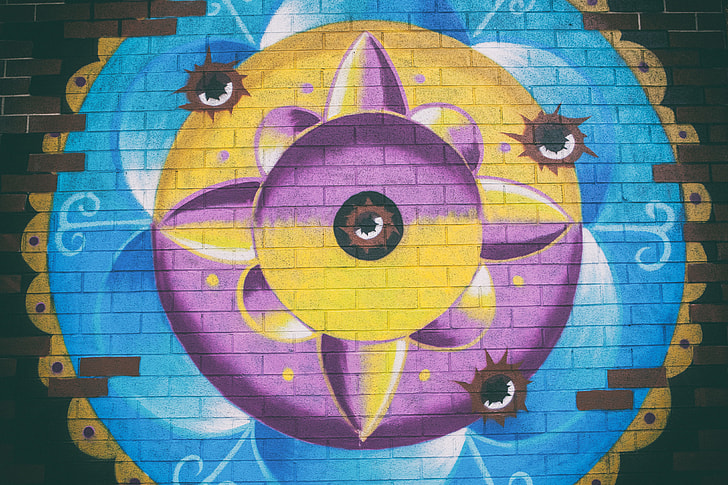 Wide angle shot of street art on a wall in Williamsburg, Brooklyn, New York City. Image captured with a Canon 5D