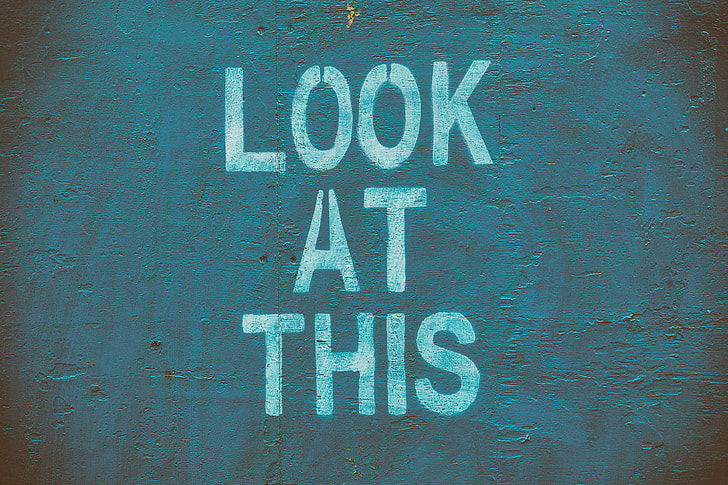 ‘Look at this’ stencil lettering on an urban wall