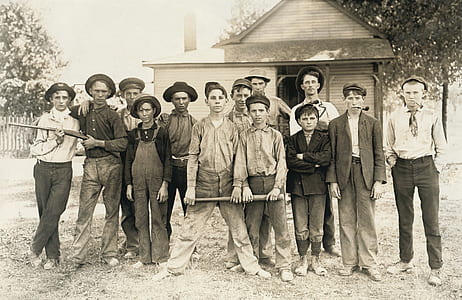 boys standing holding guns photo