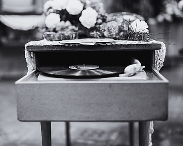 Grayscale Photo Of Vinyl Record Album Playing In Turntable
