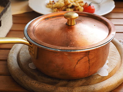 brown saucepan with lid