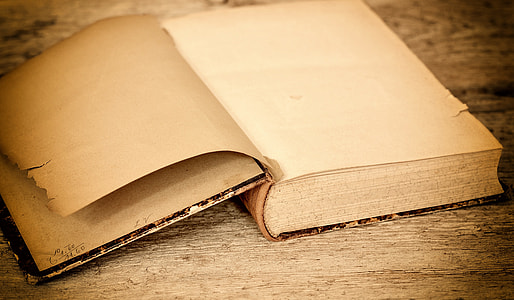 brown book on brown wooden surface