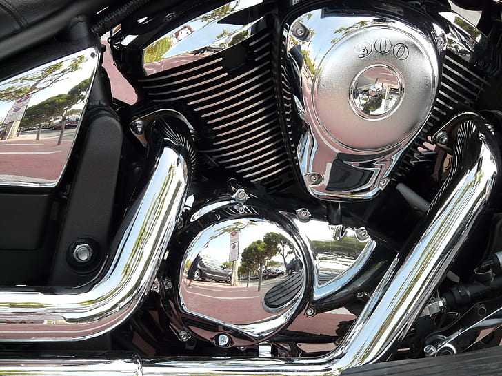 closeup photo of chrome motorcycle engine