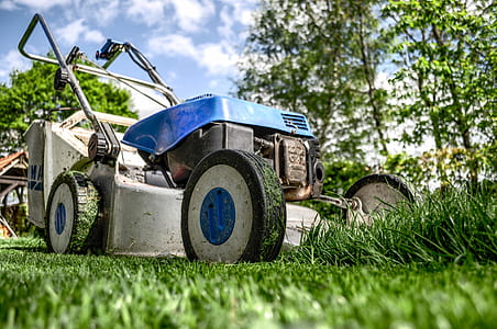 low angle photography gray and blue push mower