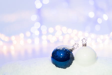 Blue Round Christmas Ornament on Snow