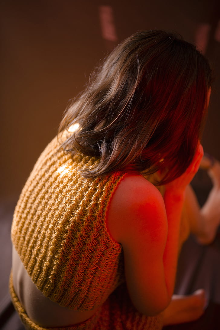 Woman Wearing Yellow Knitted Crop-top Shirt Sitting on Floor