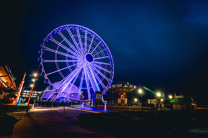 Night shot of a fairground and ferris wheel in Chicago
