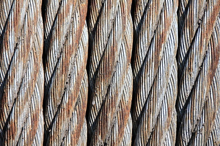 close-up photography of brown and gray rusty cables