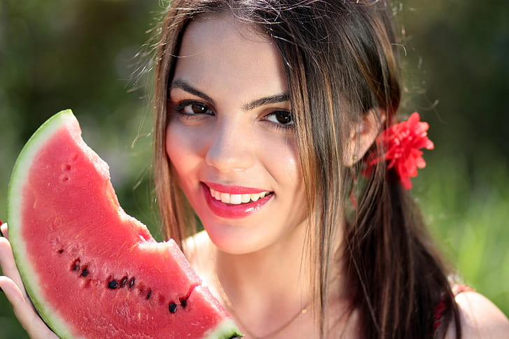 female holding watermelon