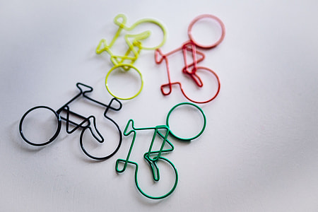 Bicycle paper clips and a wooden ruler