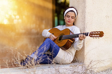 Woman Playing Guitar