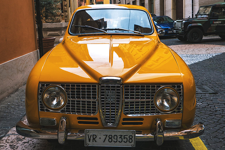 Classic old yellow Saab car