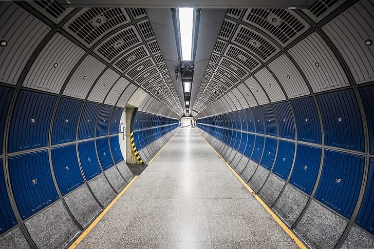 tunnel with blue and gray metal wall