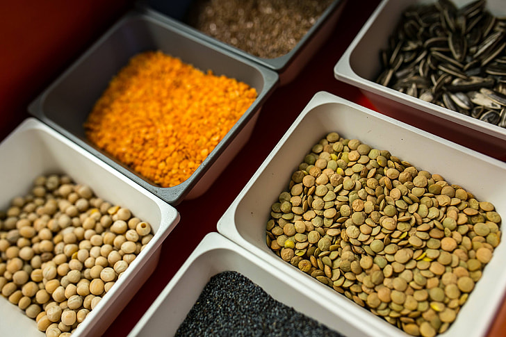 Containers with legume foods and seeds
