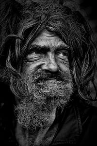 bearded man portrait grayscale photo