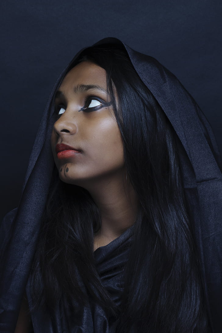 Closeup Photography of Woman Wearing Black Robe