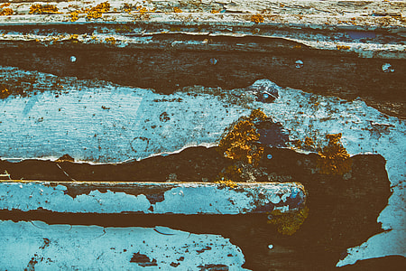 Close-up shot of faded wood and paint texture details, image captured on the coast in Deal, Kent, England